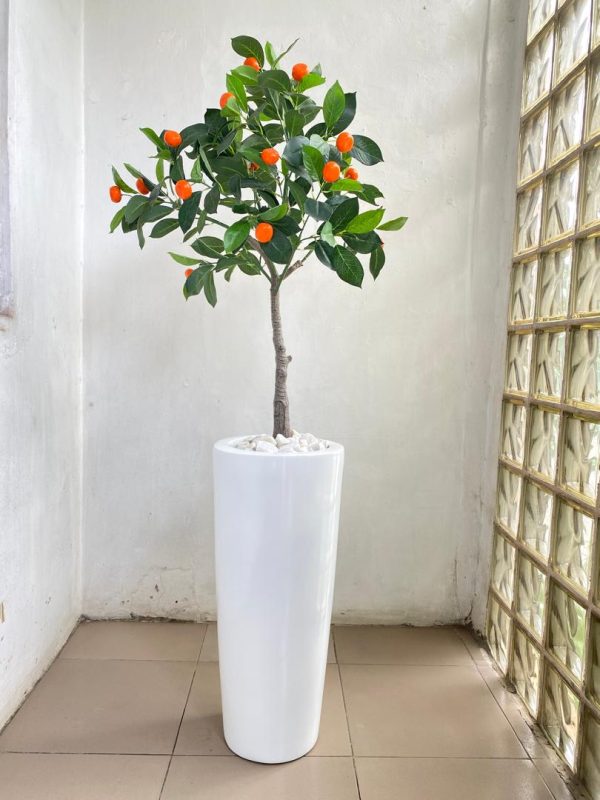 fiberglass vase potted with an artificial orange tree